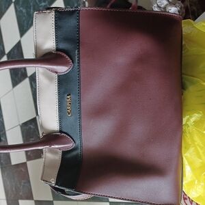 Carpisa Italian handbag, Burgundy,  black, tan